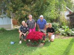Ryken family around the flower bush