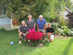 Ryken family around the flower bush